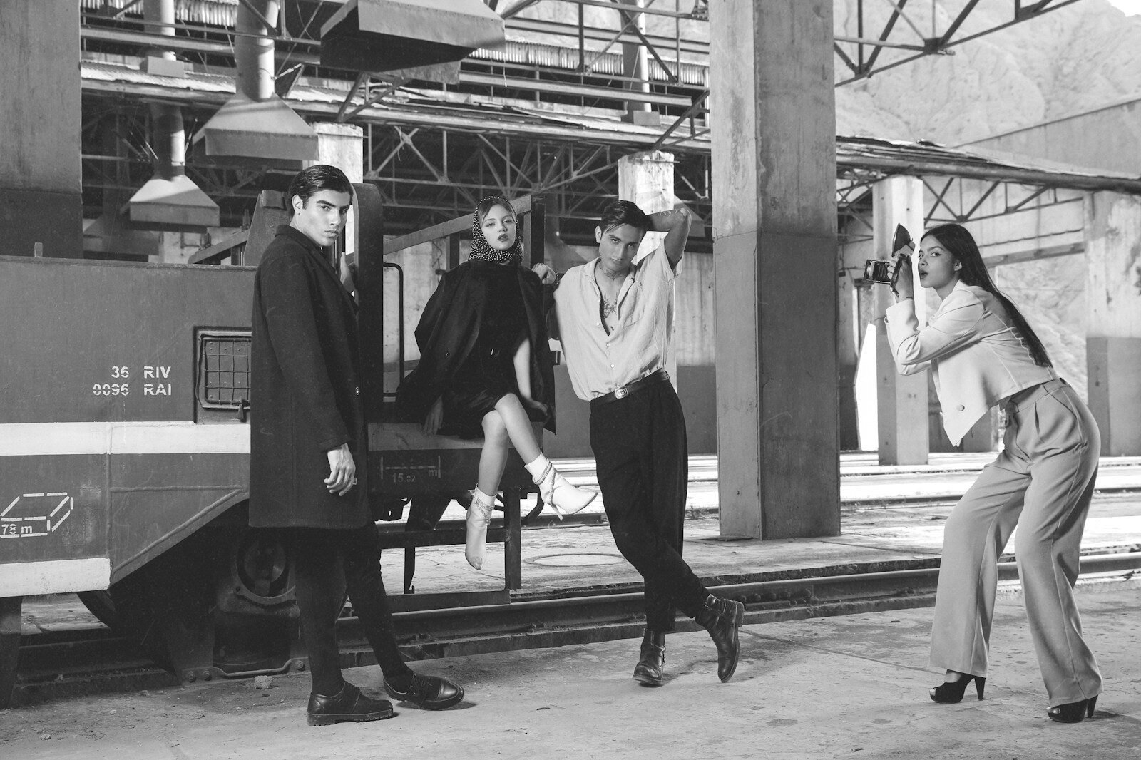 a black and white photo of a group of people